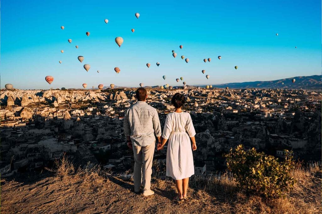 couple standing by each other in turkey cappadocia NZ5MG8F Corporate Accommodation and Houses for Rent